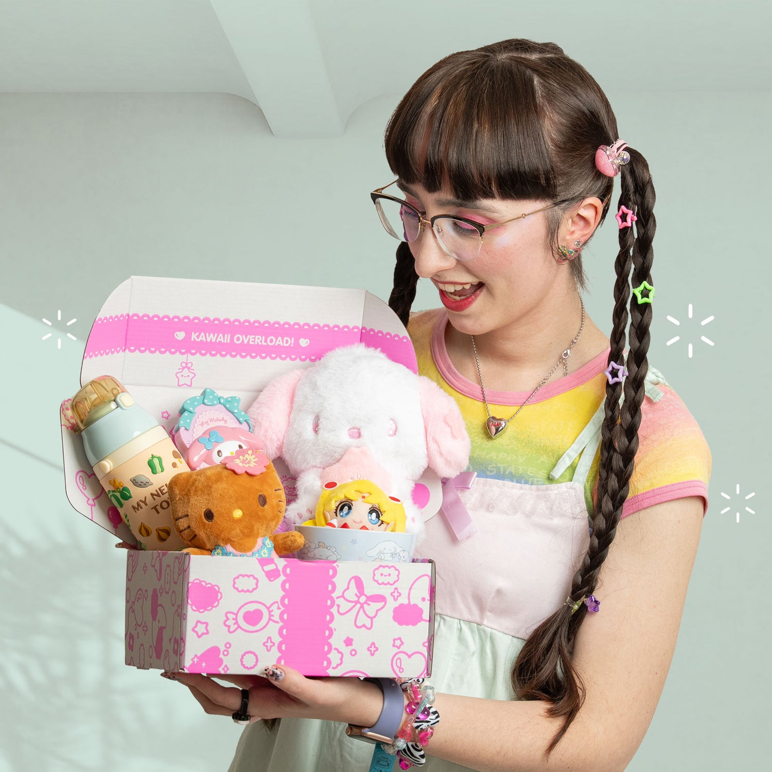 Person holding a kawaii subscription box from Japan